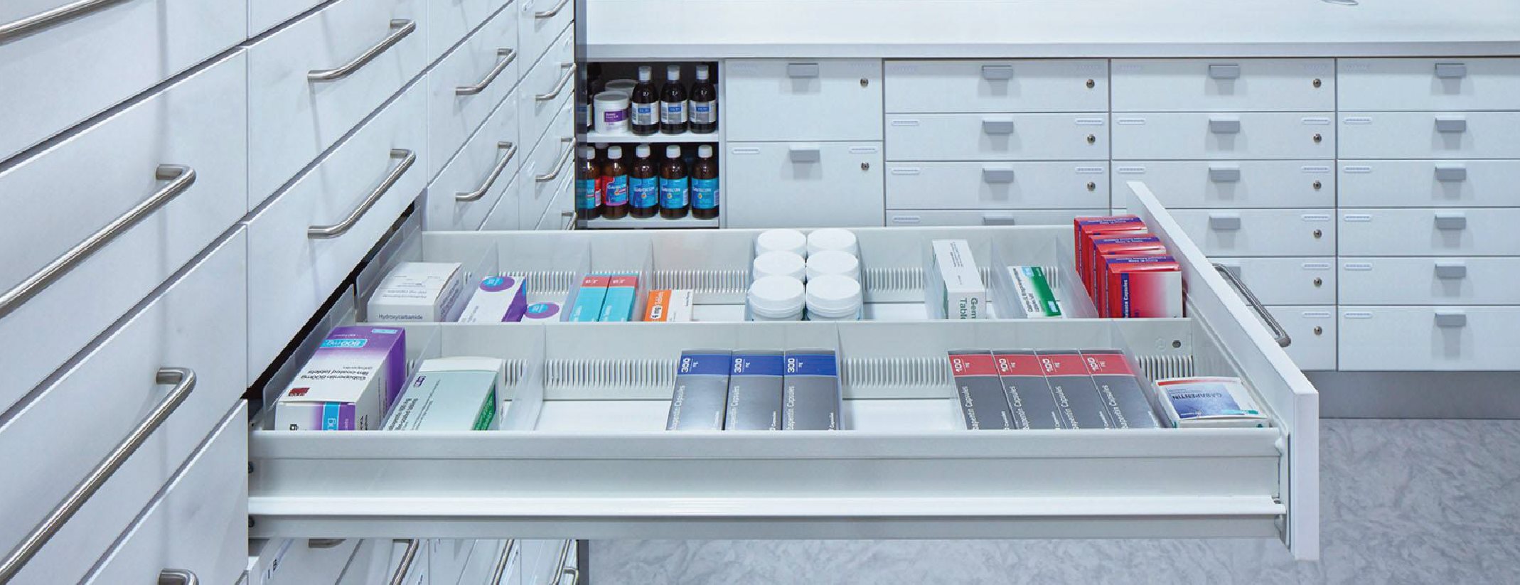 Pharmacy drawer system with organized compartments for efficient medication storage and retrieval