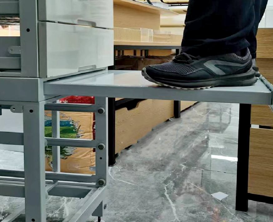 Step platform integrated with pharmacy shelf system for reaching high storage areas